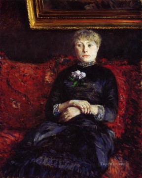  gustav - Mujer sentada en un sofá de flores rojas Gustave Caillebotte